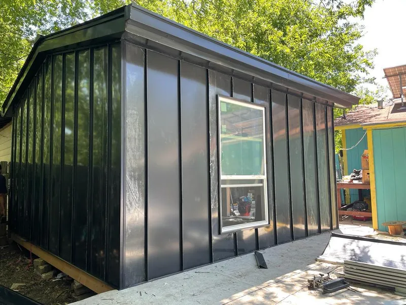 Black standing seam metal wall panels for Metal Roof Installation in Haddon