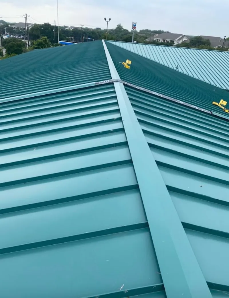 Green commercial metal roof ridge and valley for Metal Roof Repair in Haddon