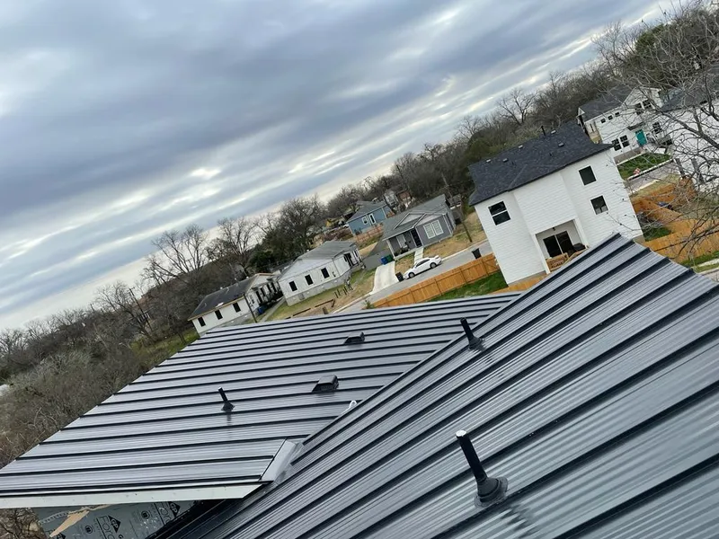 Standing seam metal roof panels with vents for Skylight Repair in Haddon